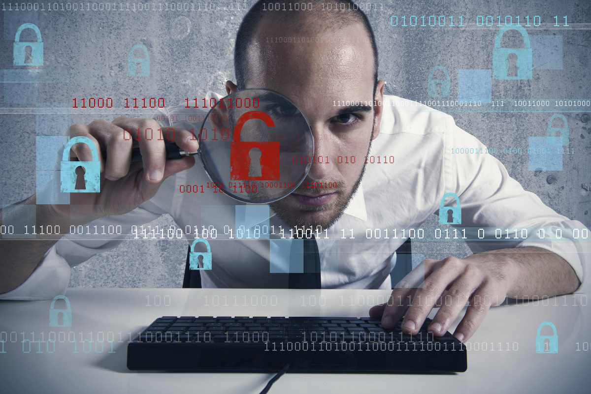 Man inspecting a screen through a magnifying glass with padlock and binary overlays